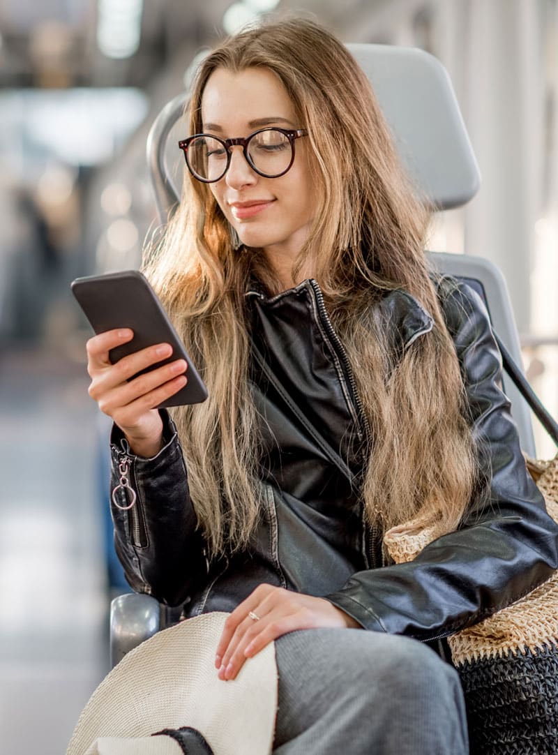 Girl-on-phone-on-train
